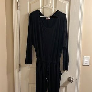 Large pink Lily black long sleeve jumpsuit. With pockets. Soft material.